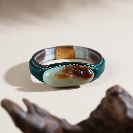 Green and white Daruma jade leather bracelet with carved jade accent