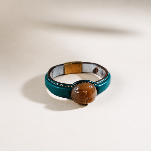 Green and honey tiger jade leather bracelet with carved jade detail