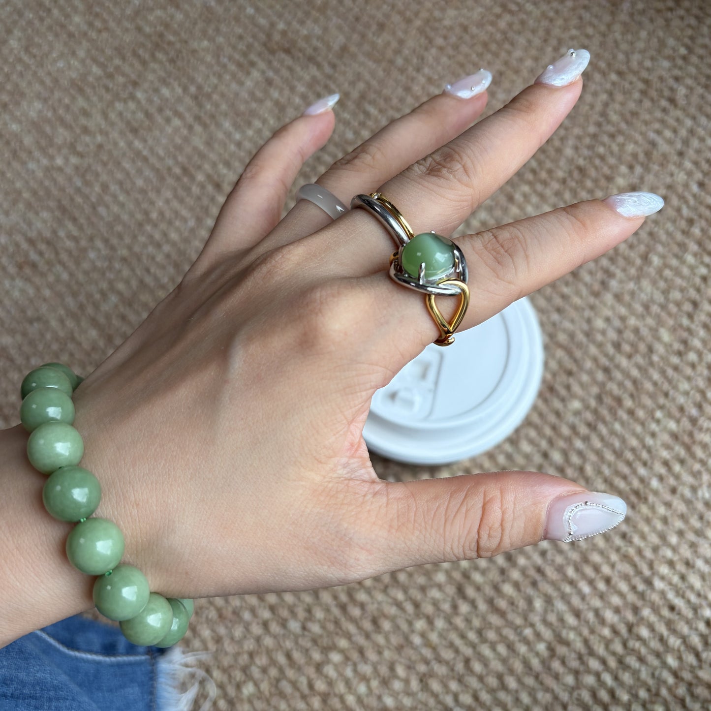 TWO-TONE CAT'S-EYE GREEN JADE RING