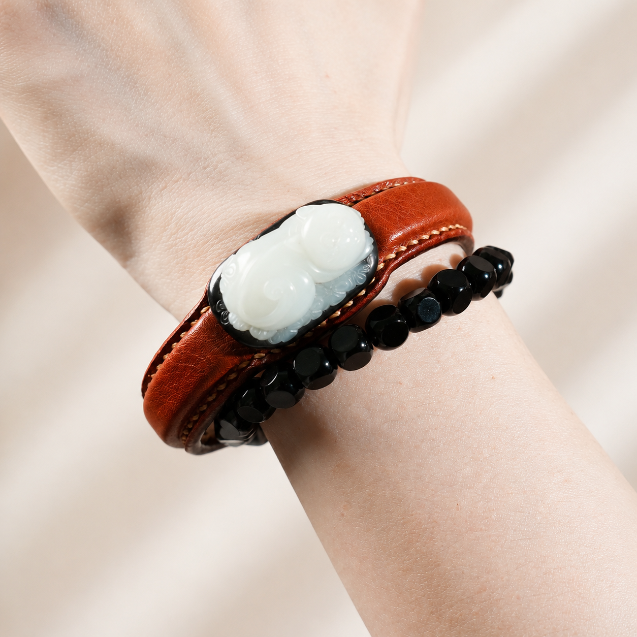 Red black and white Lucky Cat jade leather bracelet with carved jade centerpiece