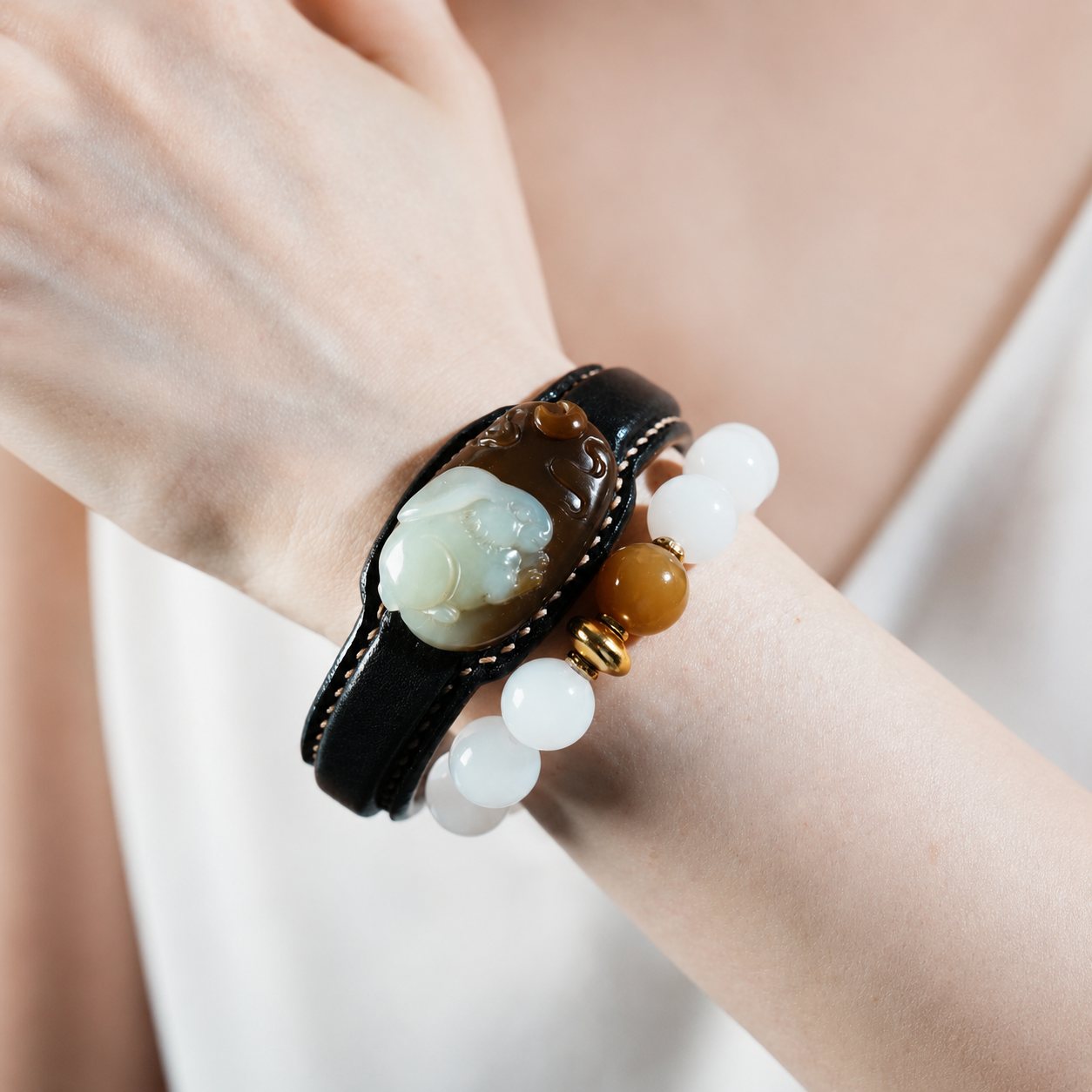 Black and white rabbit jade leather bracelet with carved jade motif