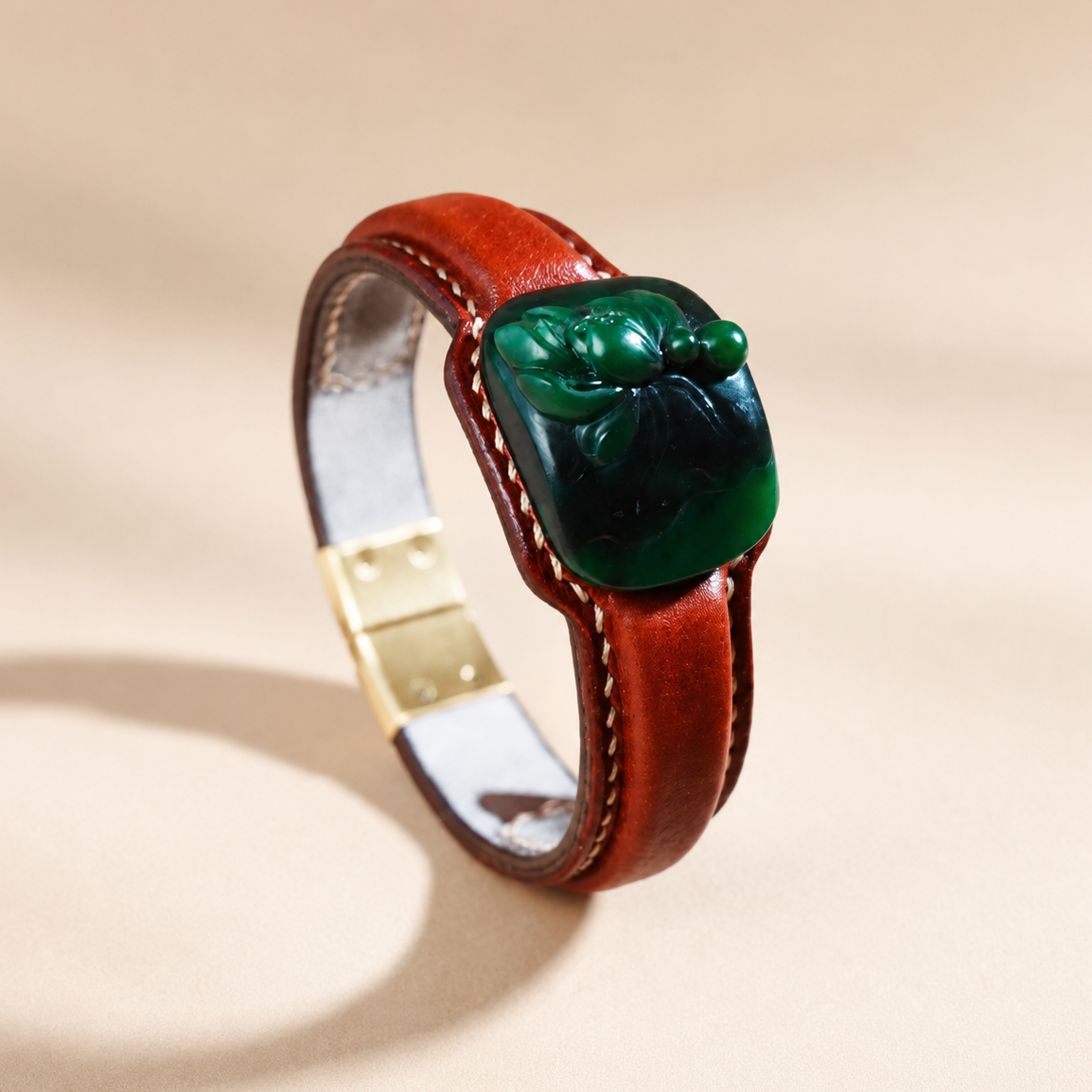 Lotus jade leather bracelet in russet and green with carved jade centerpiece