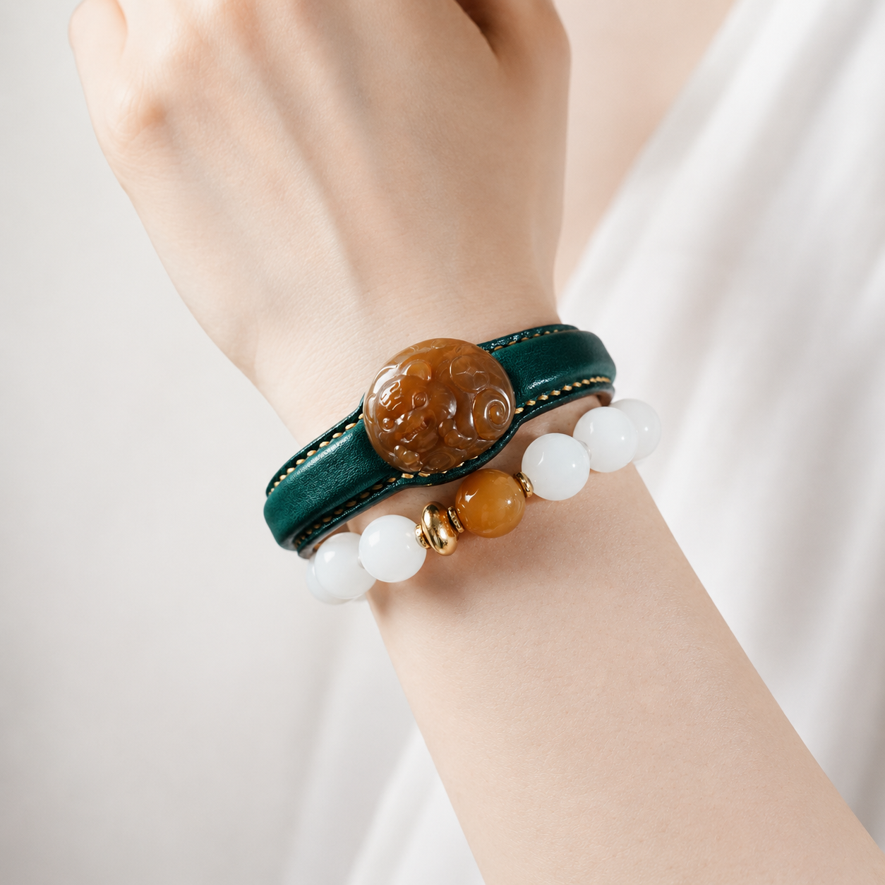 Green and honey tiger jade leather bracelet with carved jade detail